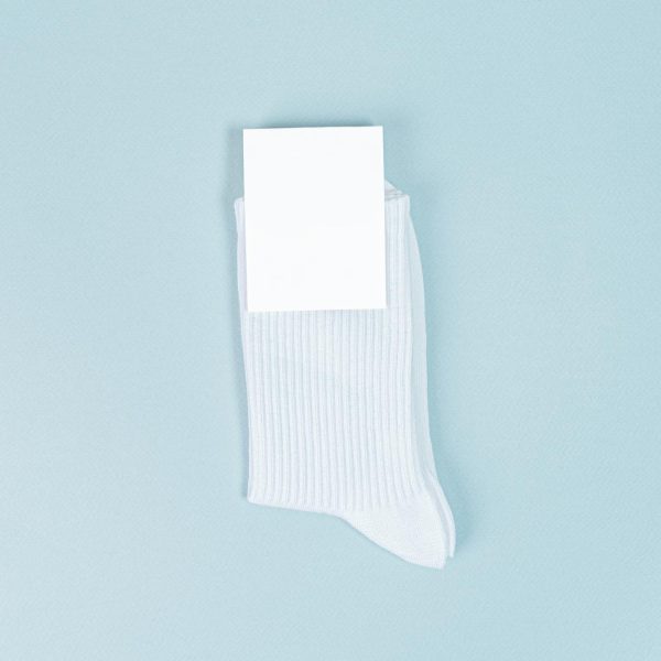 pair-white-socks-with-blank-labels-mockup-with-blank-label_428823-685